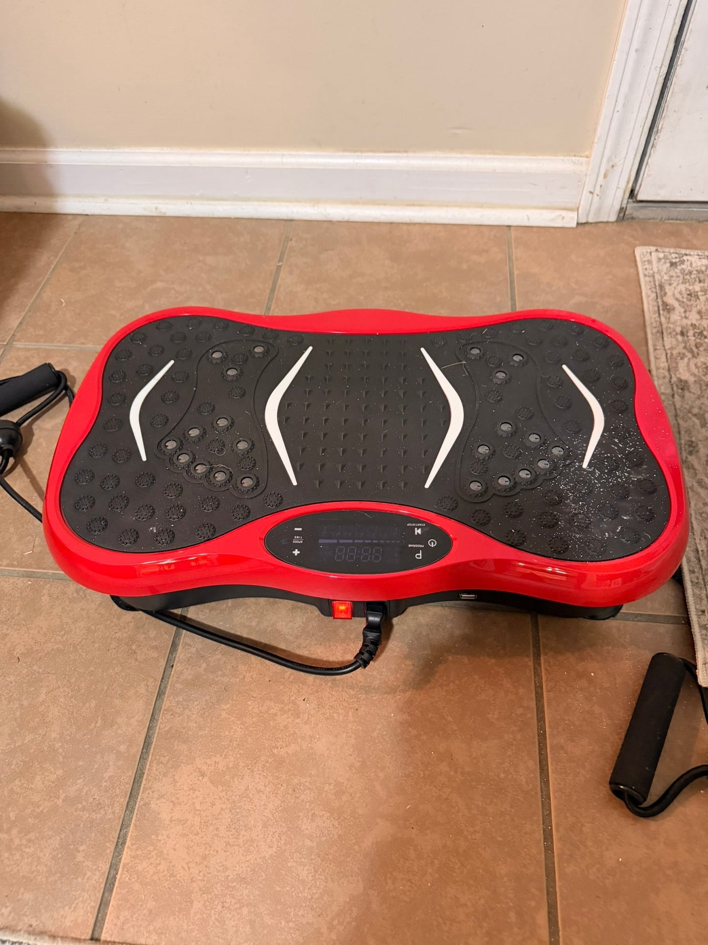 Red vibration plate — actual unit